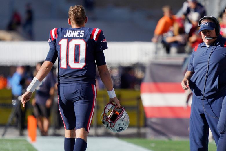 New England Patriots quarterback Tom Brady walks off the field at