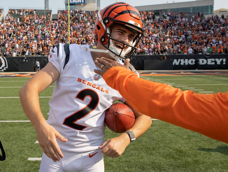 C.J. Uzomah of the Cincinnati Bengals runs the ball up the sideline