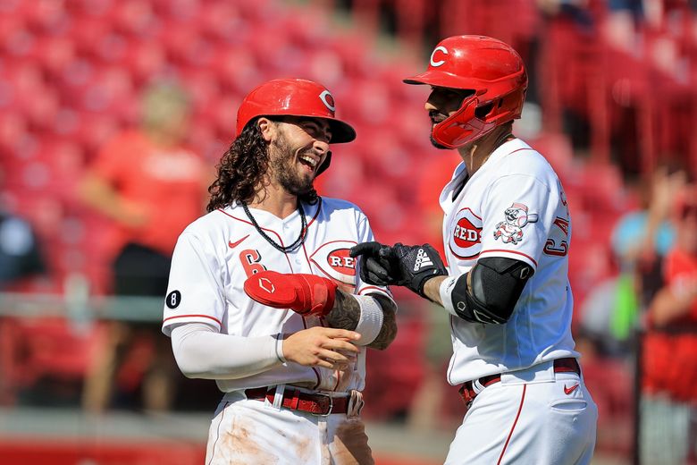 Votto helps Reds beat Pirates 13-1 to stay in playoff race – KXAN Austin