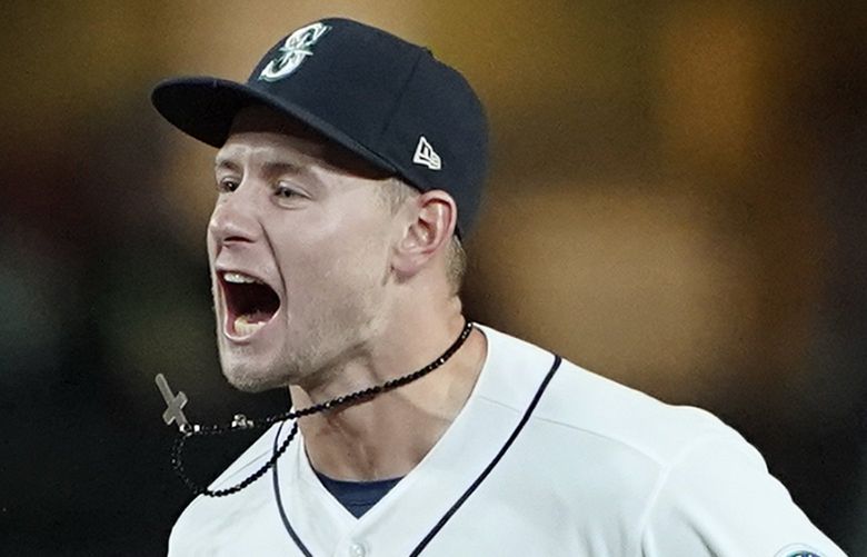 Seattle Mariners center fielder Jarred Kelenic reacts after the Mariners beat the Oakland Athletics 4-2 in a baseball game, Wednesday, Sept. 29, 2021, in Seattle. (AP Photo/Ted S. Warren) WATW137 WATW137