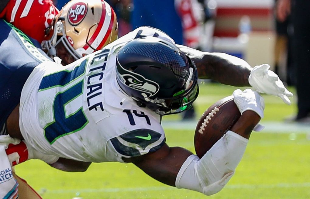 Seahawks receivers DK Metcalf, Tyler Lockett fight through injuries to play  in win over 49ers