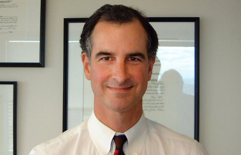 This photo of Tom Wales was taken in August 2001 in his office at the U.S. Attorney’s Office in Seattle, shortly before he was killed.