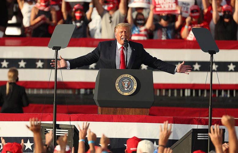 President Trump speaks to cheering supporters during a Make America Great Again Victory Rally at The Villages, Florida, on Oct. 23, 2020. (Stephen M. Dowell/Orlando Sentinel/TNS) 28790374W 28790374W