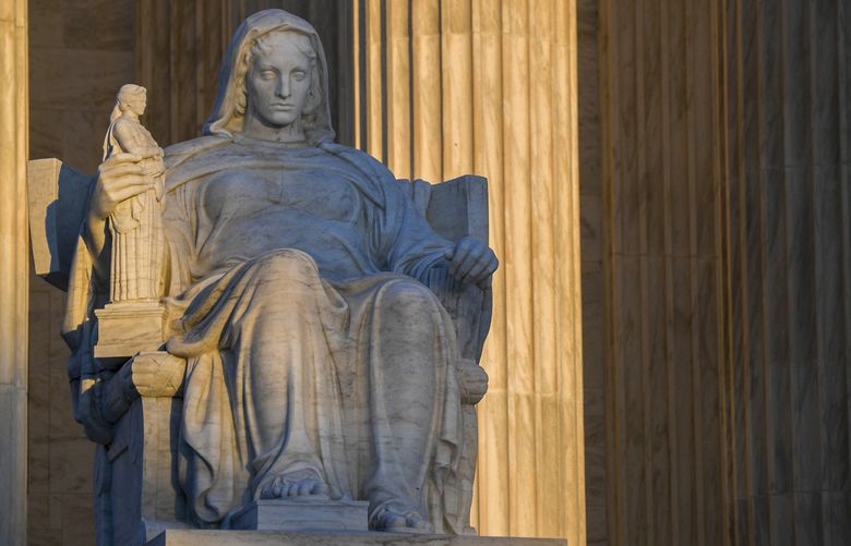 The “Contemplation of Justice” statue outside the Supreme Court building in Washington. MUST CREDIT: Washington Post photo by Jonathan Newton