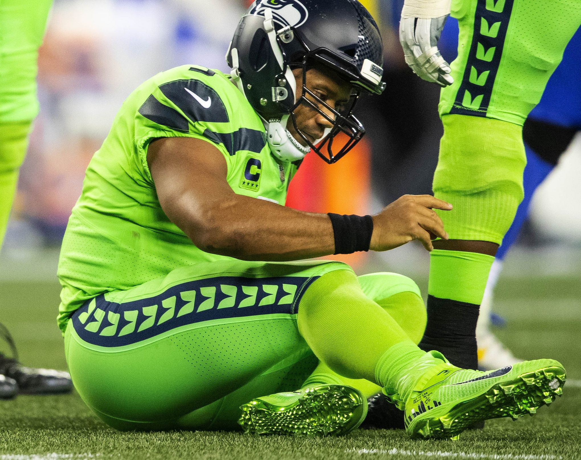 Los Angeles Rams safety Nick Scott knocks away a pass intended for Seattle  Seahawks wide receiver Tyler Lockett during the second half of an NFL  wild-card playoff football game, Saturday, Jan. 9