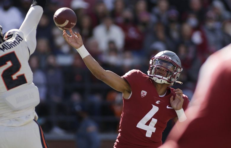 Washington State quarterback Jayden de Laura (4) throws a pass during the first half of an NCAA college football game against Oregon State, Saturday, Oct. 9, 2021, in Pullman, Wash. (AP Photo/Young Kwak) OTK OTK