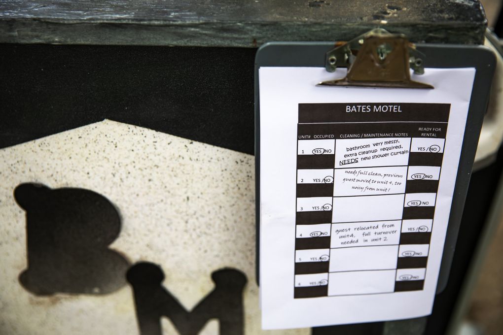 A close-up of the maid’s cart, at the mini Bates Motel that Queen Anne resident Richard Knowles has built, reveals notes such as “NEEDS new shower curtain,” a nod to the famous shower scene in “Psycho.” (Bettina Hansen / The Seattle Times)