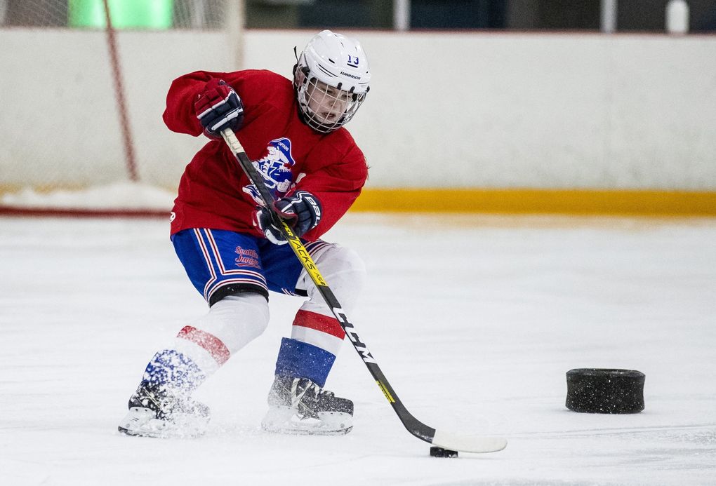 Eleven-year-old Natalya Dufour handles the puck in a drill during practice at Olympic View Arena in Mountlake Terrace on Wednesday, Oct. 5, 2021.
Young players and coaches are creating a future where hockey is more accessible and diverse.
(Amanda Snyder / The Seattle Times)