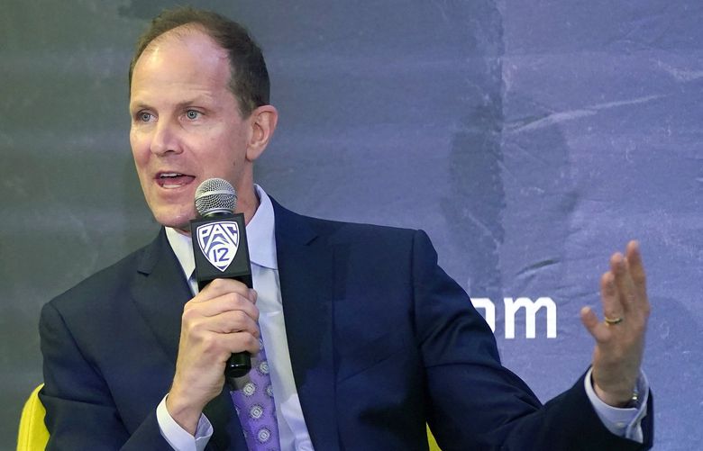 Washington head coach Mike Hopkins speaks during Pac-12 Conference NCAA college basketball media day Wednesday, Oct. 13, 2021, in San Francisco. (AP Photo/Jeff Chiu) CAJC124