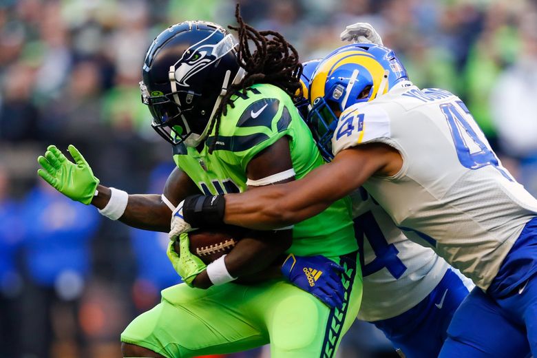 Seattle Seahawks' Alex Collins (41) runs for a TD during an NFL