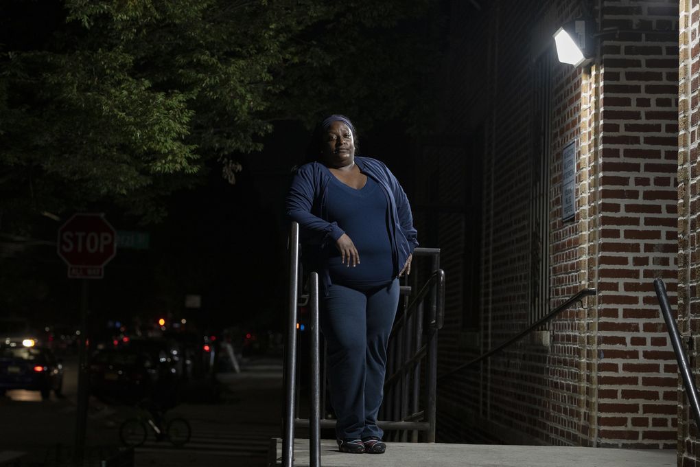 Tiffany Fields, a home health aide, at her home in New York. (James Estrin / The New York Times)