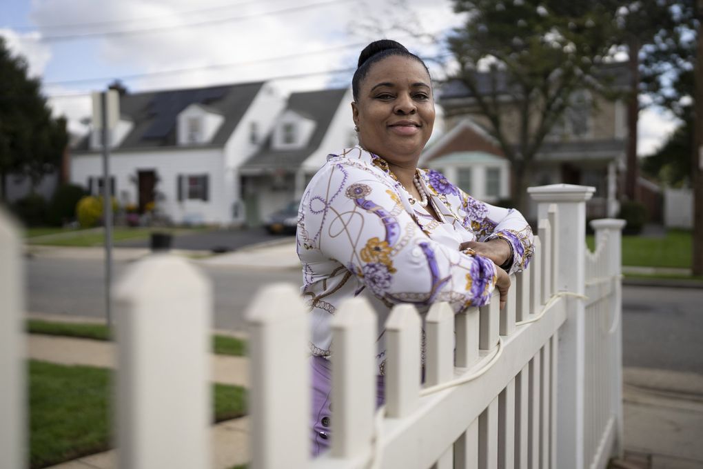 Mechelle Webb at her home in New York. As Webb sat in the chair waiting for her COVID-19 vaccine, she began to sing the words of a gospel song: “I’m no longer a slave to fear.” (James Estrin / The New York Times)