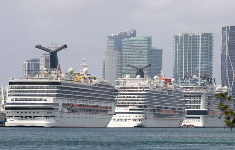 Carnival Cruise Line’s Sunrise and Vista ships, along with the MSC Meraviglia, are docked at PortMiami in February. (Susan Stocker/South Florida Sun Sentinel/TNS) 