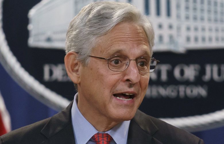 FILE – In this Sept. 9, 2021, file photo, Attorney General Merrick Garland announces a lawsuit to block the enforcement of a new Texas law that bans most abortions, at the Justice Department in Washington.  On Friday, Oct. 8, The Associated Press reported on stories circulating online incorrectly claiming Garland has instructed the FBI to mobilize against parents who oppose critical race theory in public schools, citing â€˜threats.â€™    (AP Photo/J. Scott Applewhite, File) NYNN102 NYNN102
