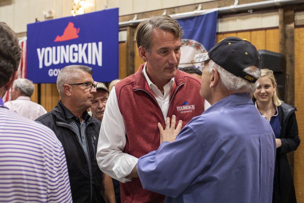 Glenn Youngkin, a Republican running for Virginia governor, talks with an attendee at a campaign event in Winchester, Va., on Oct. 6, 2021. Virginia Republicans in a tight governor’s race have been staging “Parents Matter” rallies. (Jason Andrew / The New York Times)