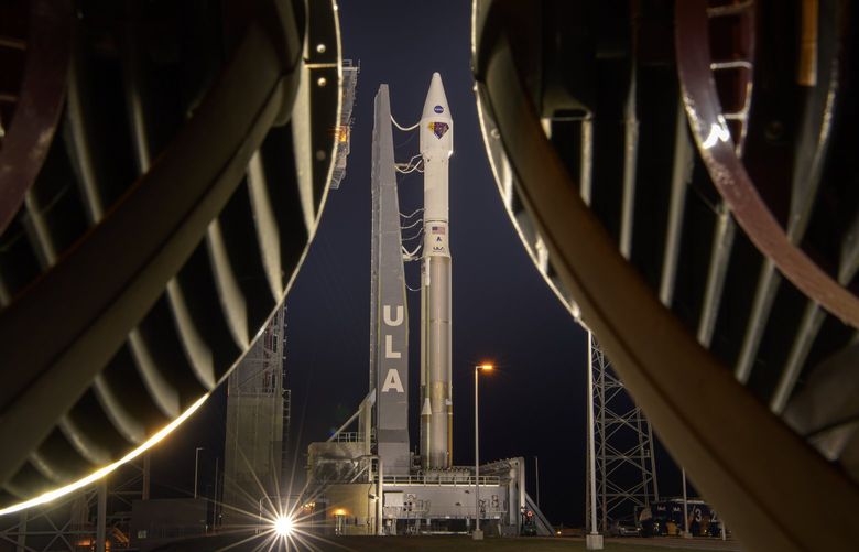 This photo provided by NASA shows a United Launch Alliance Atlas V rocket with the Lucy spacecraft aboard at Space Launch Complex 41, Thursday, Oct. 14, 2021, at Cape Canaveral Space Force Station in Florida. Lucy will be the first spacecraft to study Jupiter’s Trojan Asteroids. Like the mission’s namesake – the fossilized human ancestor, “Lucy,” whose skeleton provided unique insight into humanity’s evolution – Lucy will revolutionize our knowledge of planetary origins and the formation of the solar system. (Bill Ingalls/NASA via AP) NY119 NY119