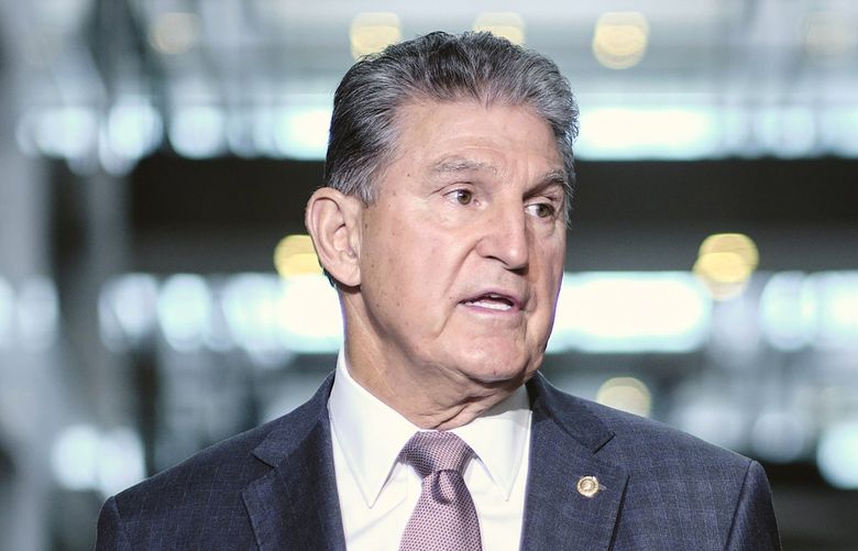 FILE â€” Sen. Joe Manchin (D-W.Va.) speaks to reporters on Capitol Hill in Washington on Wednesday, Oct. 6, 2021, ahead of an expected vote in the Senate on the debt limit. The West Virginia Democrat told the White House he is firmly against a clean electricity program that is the muscle behind the presidentâ€™s plan to battle climate change. (T.J. Kirkpatrick/The New York Times) XNYT151 XNYT151