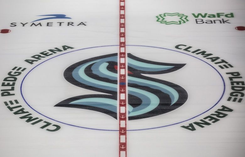 The Kraken logo is located at center ice at Climate Pledge Arena at Seattle Center on Saturday, Oct. 16, 2021. 218527