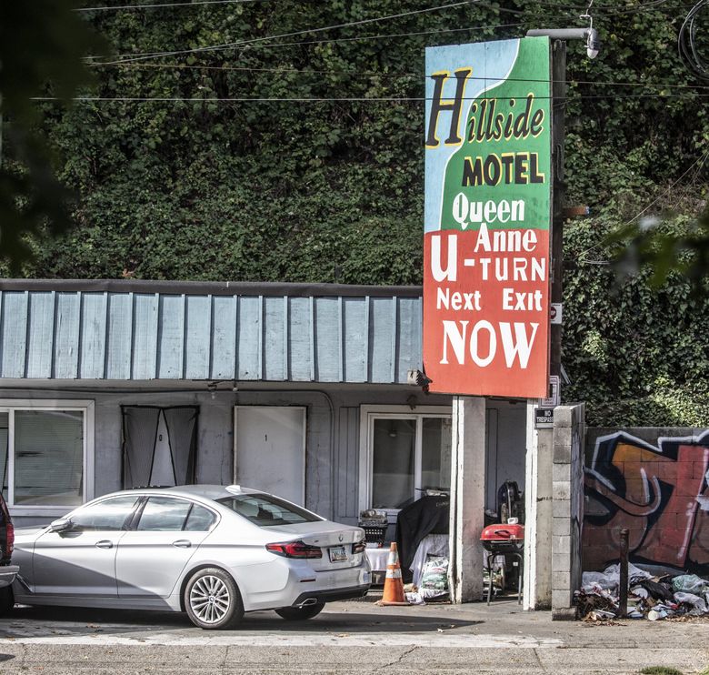 According to neighbors and police, squatters are selling drugs out of the Hillside Motel on Aurora Avenue North. (Steve Ringman / The Seattle Times)