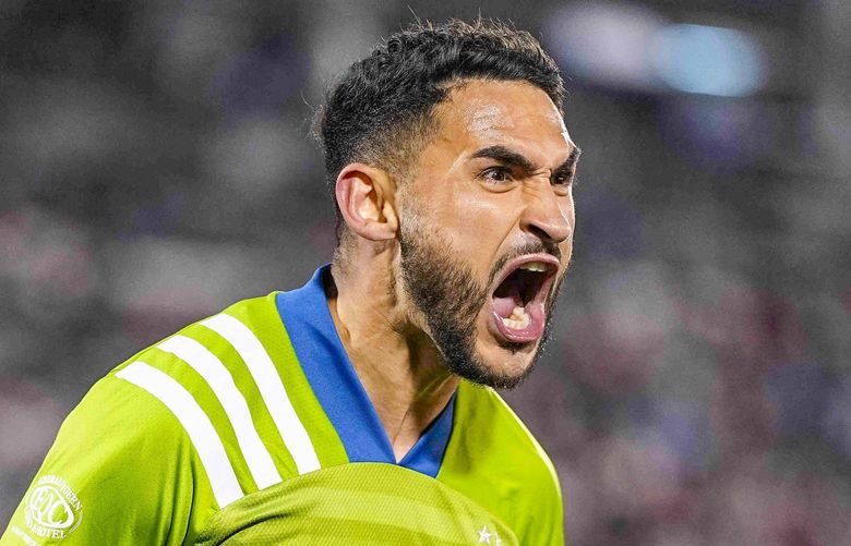 Seattle Sounders midfielder Cristian Roldan (7) celebrates a goal gainst the Colorado Rapidsduring the second half of an MLS soccer match Wednesday, Oct. 20, 2021, in Commerce City, Colo. (AP Photo/Jack Dempsey) COJD110