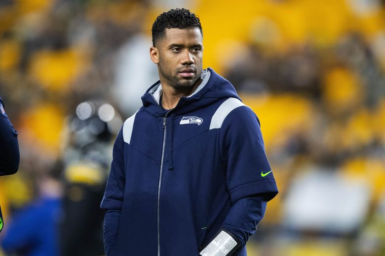Seahawks QB Russell Wilson 'making progress' in his recovery from finger  surgery, Pete Carroll says