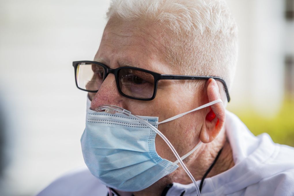 Hector Garcia’s voice is raspy. After almost a year on a ventilator, he only recently regained the ability to speak. (Daniel Kim / The Seattle Times)