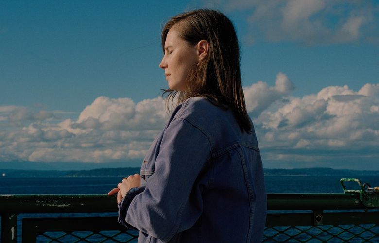 Amanda Knox on a ferry in Washington state, Oct. 6, 2021. Ten years after being cleared of a heinous crime, she is still trying to tell her story on her own terms. (Ricardo Nagaoka/The New York Times)