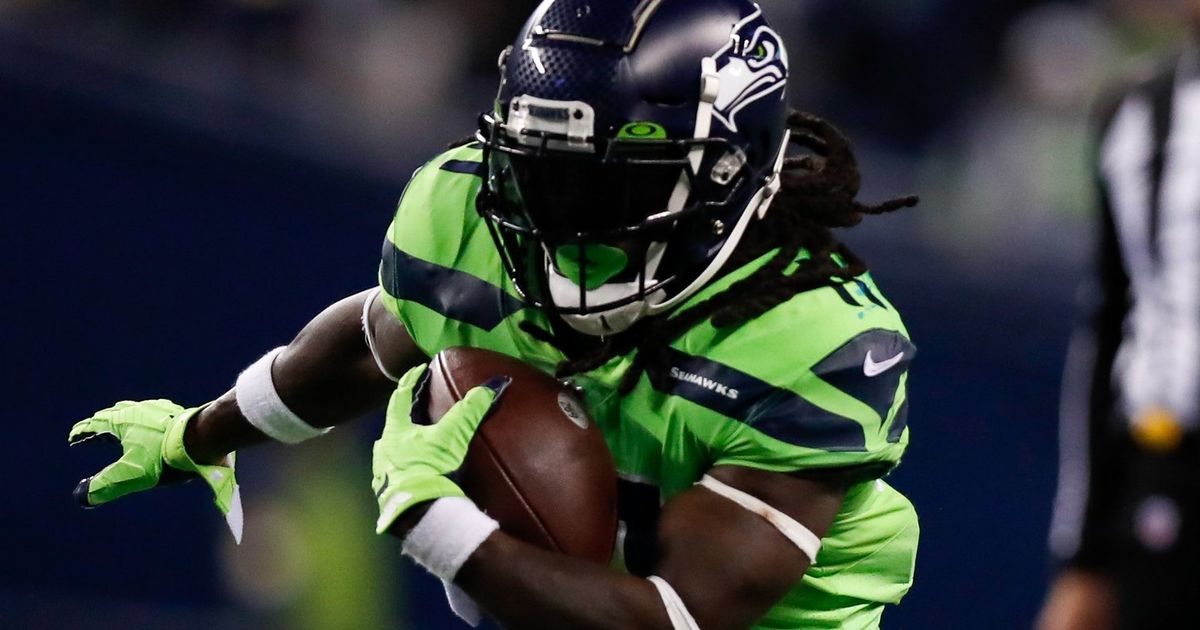 Why Running Back Alex Collins Wears a Super Dark Facemask Visor