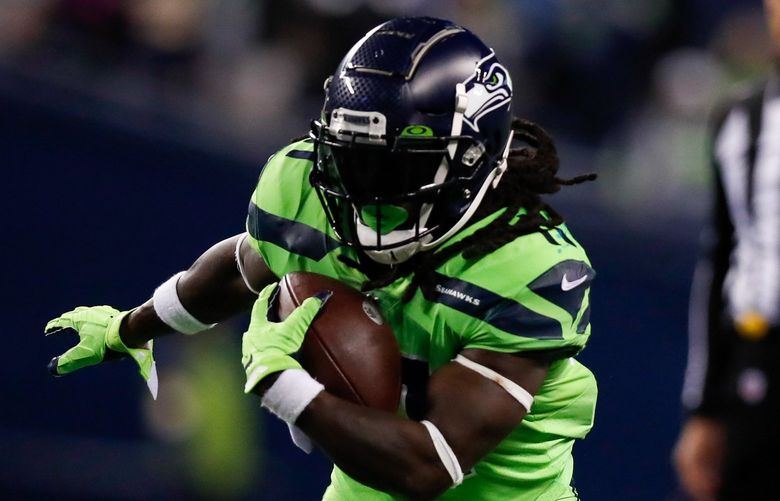 Lumen Field – Seattle Seahawks vs. Los Angeles Rams – 100721
Seattle Seahawks running back Alex Collins rushes against the Los Angeles Rams during the fourth quarter Thursday, Oct. 7, 2021, in Seattle. 218444