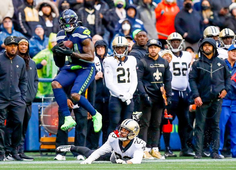 Seattle Seahawks wide receiver DK Metcalf (14) during an NFL football game  against the Denver Broncos, Monday, Sept. 12, 2022, in Seattle, WA. The  Seahawks defeated the Bears 17-16. (AP Photo/Ben VanHouten