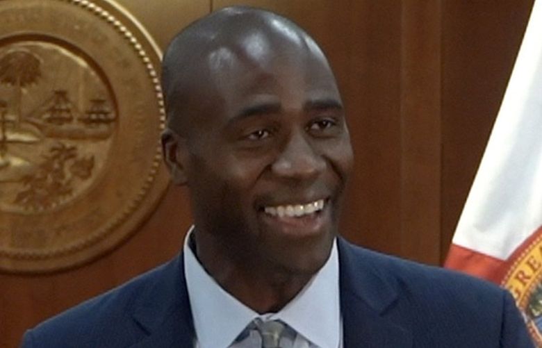 Gov. Ron DeSantis appoints Dr. Joseph Ladapo as the next surgeon general of Florida on Sept. 21, 2021. (Governor’s Office photo/TNS) 30488146W 30488146W