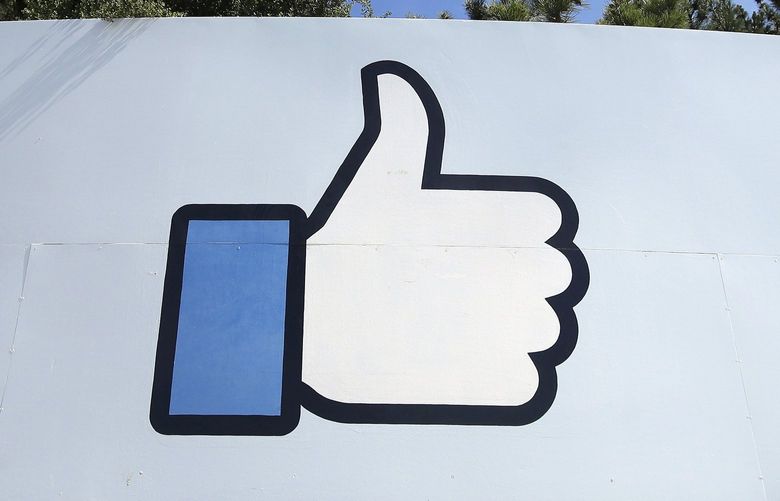 FILE – In this April 14, 2020, file photo, the thumbs up “Like” logo is shown on a sign at Facebook headquarters in Menlo Park, Calif., USA. From complaints whistleblower Frances Haugen has filed with the SEC, along with redacted internal documents obtained by The Associated Press, the picture of the mighty Facebook that emerges is of a troubled, internally conflicted company, where data on the harms it causes is abundant, but solutions are halting at best. (AP Photo/Jeff Chiu, File) XNC111 XNC111