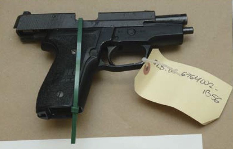 FILE – This evidence photo from the criminal complaint of the U.S. District Court for Massachusetts v. Ashley Bigsbee for illegal possession of a stolen firearm on Nov. 15, 2015, in Suffolk, Mass., shows one of ten M11 semiautomatic handguns that former Army Reserve member James Morales stole from the Lincoln Stoddard Army Reserve Center in Worcester, Mass. Overall, AP has found that at least 2,000 firearms from the Army, Marines, Navy or Air Force were lost or stolen during the 2010s. (U.S. District Court for Massachusetts via AP) NY475 NY475
