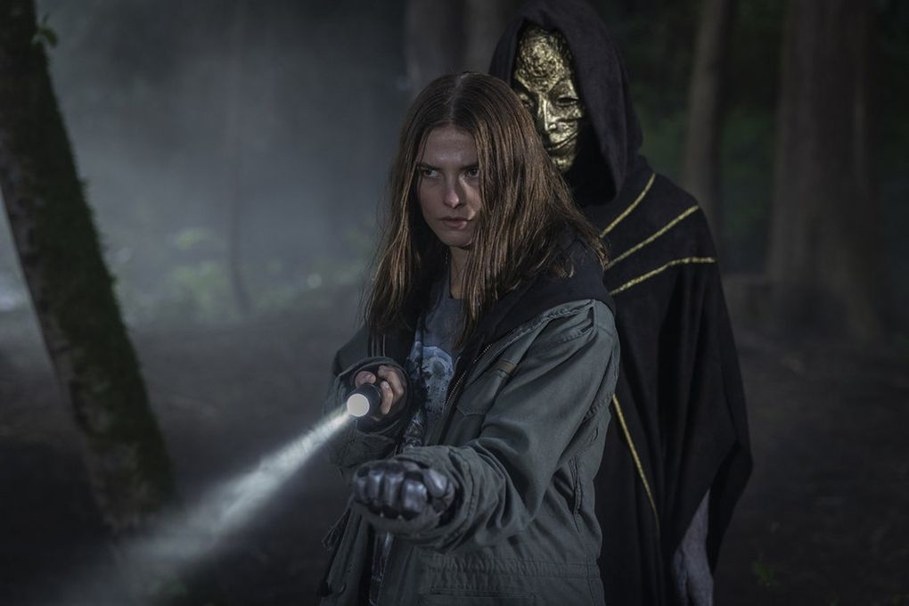 “The Girl in the Woods,” with Stefanie Scott and Mark Steger, is a supernatural drama set in the Pacific Northwest. (Scott Green / Peacock)