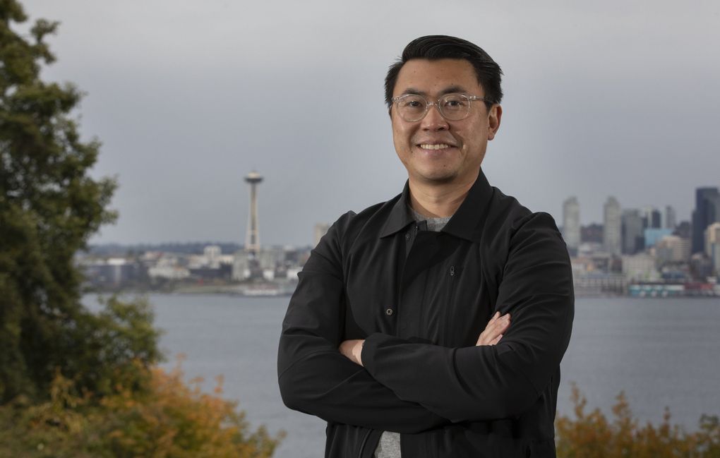 State Sen. Joe Nguyen poses in front of the Seattle skyline at Hamilton Viewpoint Park in West Seattle on Oct. 5. (Ellen M. Banner / The Seattle Times)