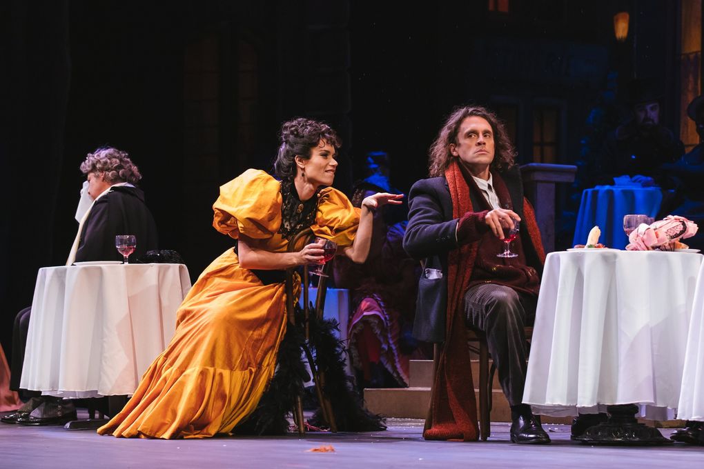 Ginger Costa-Jackson as Musetta and John Moore as Marcello in Seattle Opera’s “La Bohème.” (Sunny Martini)