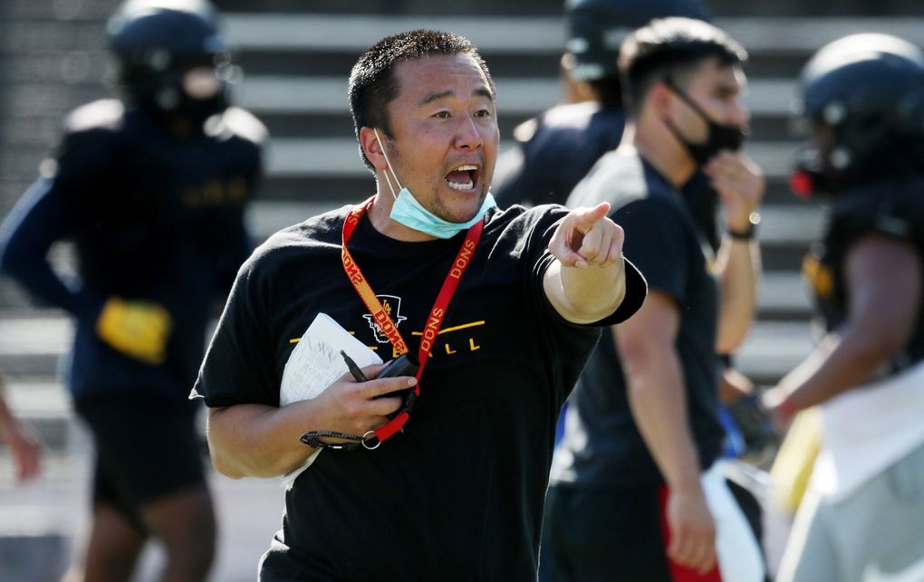 Lincoln football coach Masaki Matsumoto was born in Japan and picked up football while growing up in Shoreline. (Ken Lambert / The Seattle Times)