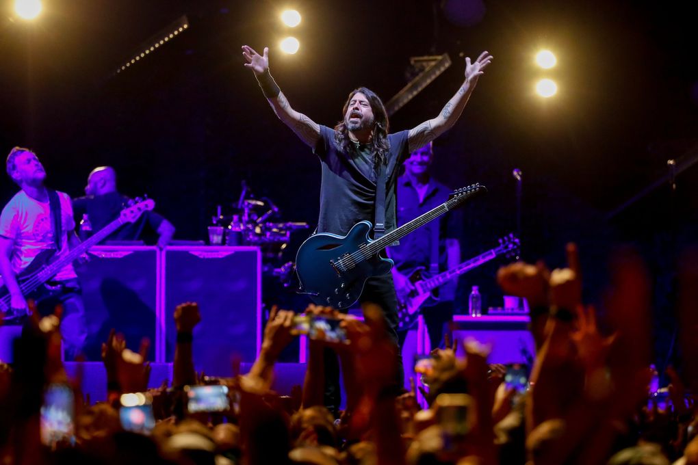 Dave Grohl of the Foo Fighters performs at Climate Pledge Arena Tuesday, Oct. 19, 2021, in Seattle. (Jennifer Buchanan / The Seattle Times)