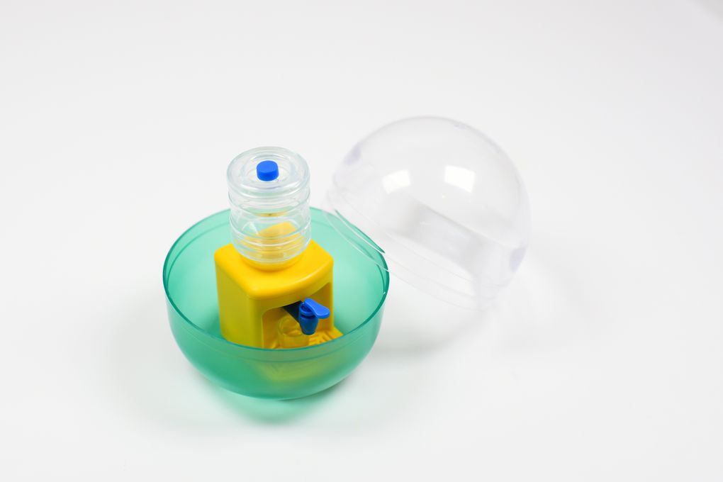 A miniature water cooler that dispenses ant-size droplets, made by Toys Cabin, is displayed in the company’s offices in Shizuoka, Japan, on Sept. 17. (Noriko Hayashi / The New York Times)