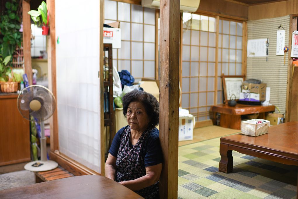 Chiyoko Yoshikawa opposes the construction of the concrete wall, but hesitates to get involved in the dispute. (Noriko Hayashi / The New York Times)