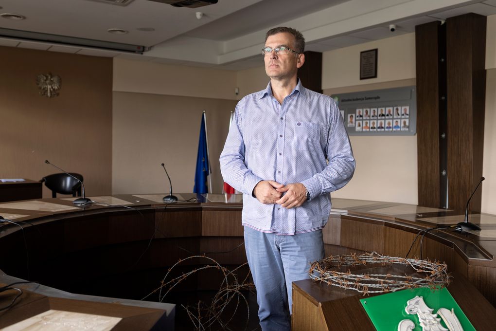 Marek Nazarko, mayor of the town of Michalowo, Poland, in a conference room on Oct. 1, 2021. “They are peaceful, desperate people who just want to cross to a better life,” Nazarko said of the migrants arriving from Belarus. (Maciek Nabrdalik / The New York Times)