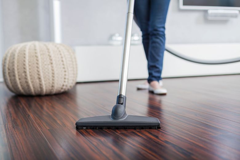 There are many types of wood floors, but they share the same basic care needs: removing grit promptly, cleaning monthly, and recoating or spot-repairing as needed. (Getty Images)