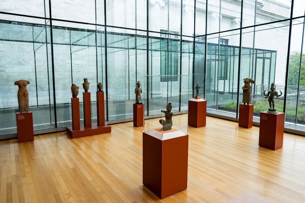 The kneeling male figure in the forefront, sold by a Latchford associate in 1978, is on display along other items inside the Indian and Southeast Asian gallery at The Cleveland Museum of Art in Cleveland on May 5, 2021. (Washington Post photo by Salwan Georges)