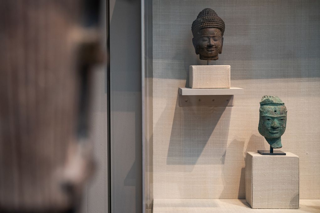 A Khmer Buddha head, a gift from Douglas Latchford in 1983, is display at The Metropolitan Museum of Art in New York City on May 3, 2021. (Washington Post photo by Salwan Georges)