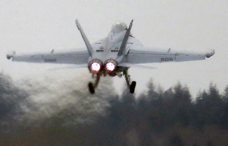 An EA-18G Growler takes off from Naval Air Station Whidbey Island during an exercise, Thurs., March 10, 2016. Some Lopez Island residents are among those in the area upset with noise levels, which appear more bothersome from the past Prowler jets used by the Navy.