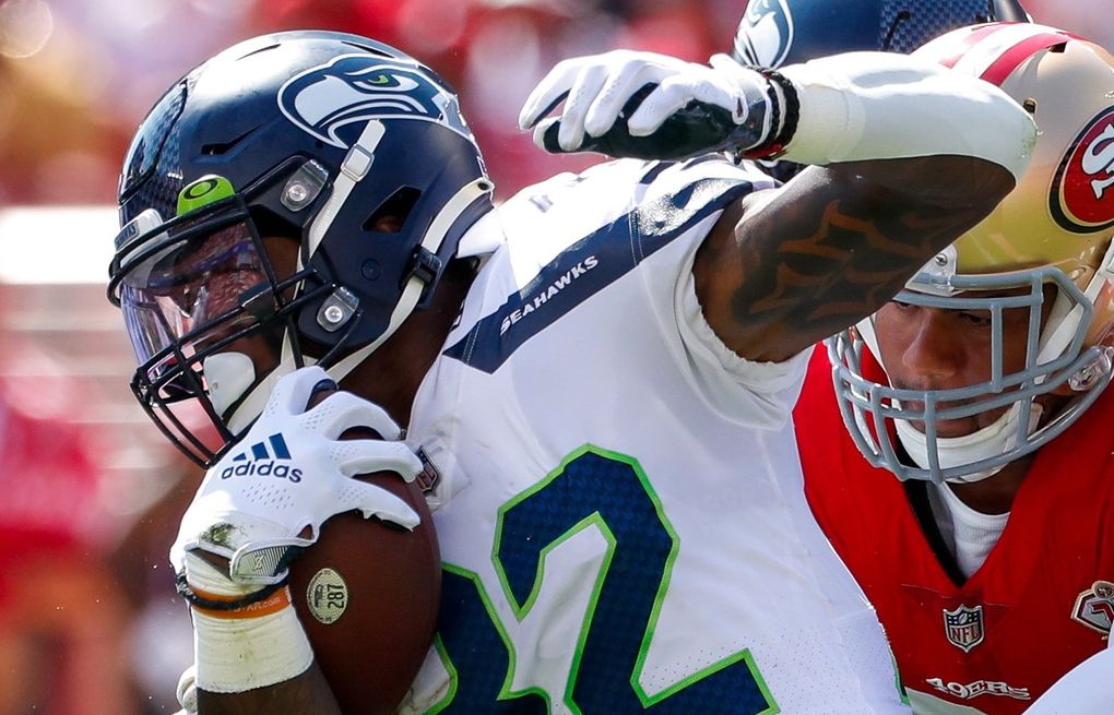 Seahawks RB Chris Carson doesn't practice Wednesday while team continues to  evaluate neck injury