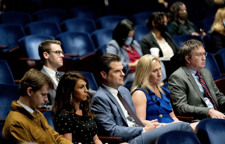 Rep. Matt Gaetz (R-Fla.), center, with, from left, Reps. Lauren Boebert (R-Colo.), Marjorie Taylor Greene (R-Ga.) and Thomas Massie (R-Ky.) listen as Attorney General Merrick Garland testifies before the House Judiciary Committee in Washington on Thursday, Oct. 21, 2021. The Justice Department has added two top prosecutors from Washington to the child sex trafficking investigation of Gaetz, according to two people briefed on the matter. (Stefani Reynolds/The New York Times) XNYT146 XNYT146