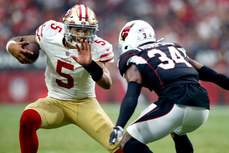 San Francisco 49ers quarterback Trey Lance warms up in a Crucial