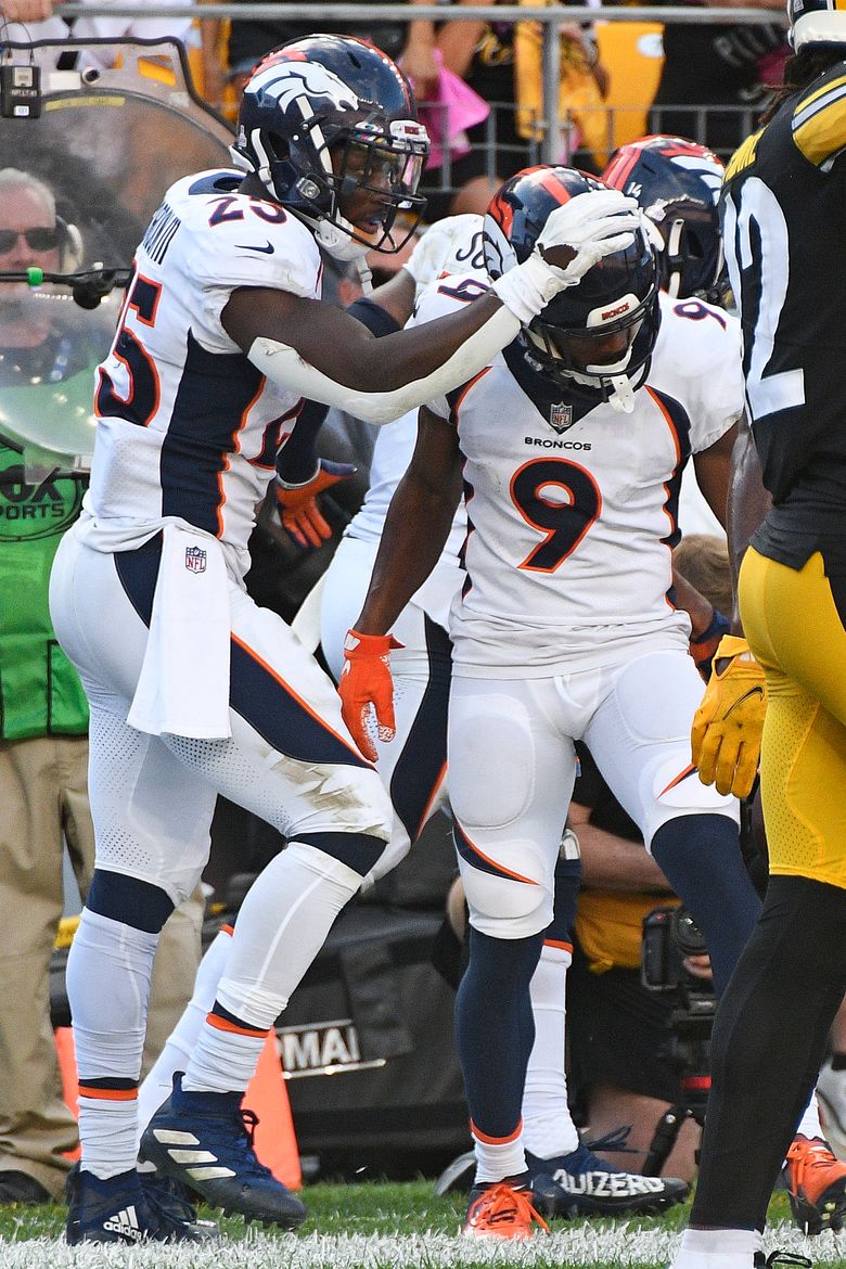 Denver Broncos' QB Kendall Hinton Throws Passes During Saints