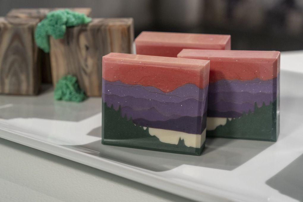 Roxanne Moore’s soaps that she makes on “Meet Your Makers Showdown” on discovery+ include a wood grain-patterned soap inspired by the rainforest and one depicting Hurricane Ridge. (Gilles Mingasson / Getty Images)